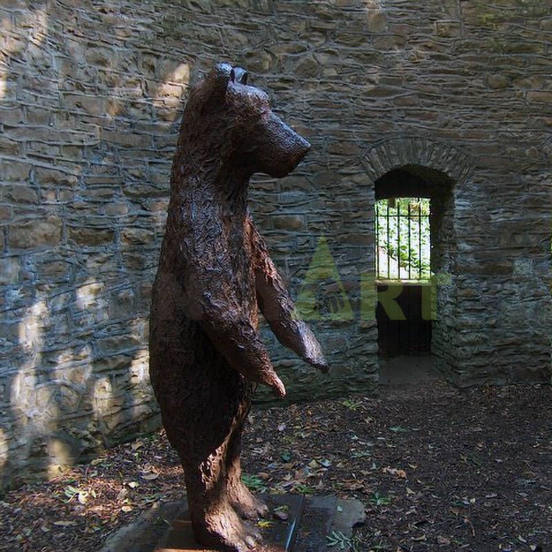 Little bear cubs with their mother in a bronze sculpture