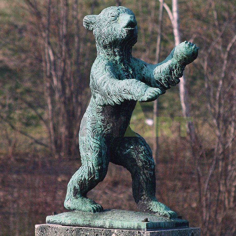 A sculpture of polar bears hugging each other