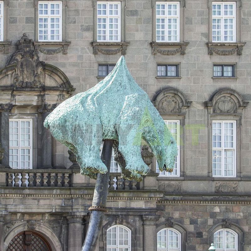 A sculpture of polar bears hugging each other