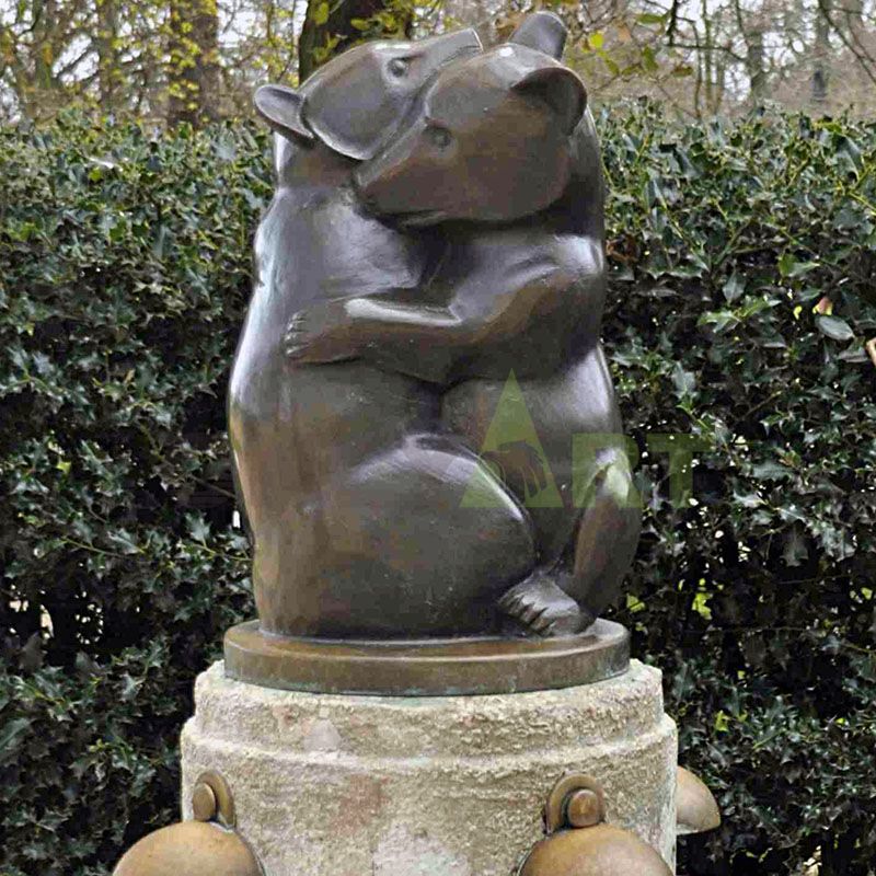 A sculpture of polar bears hugging each other