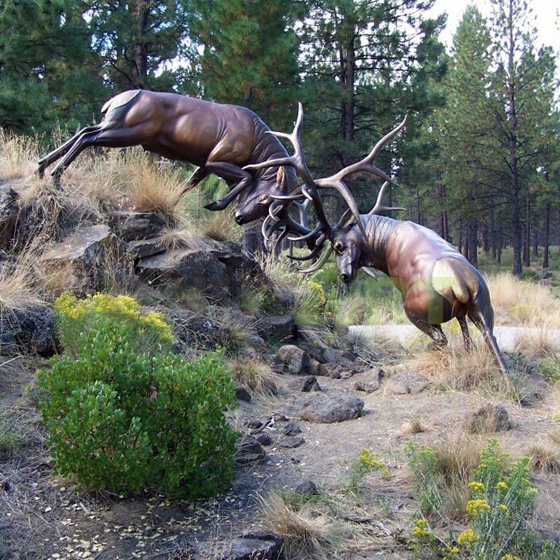 Wow, look, two elk fighting a bronze statue