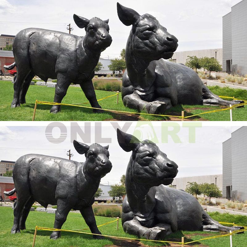 Decorative bronze bull sculpture beside the park lake