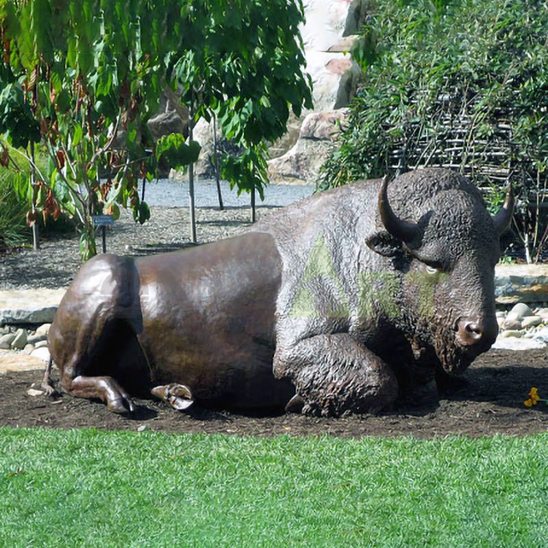 Animal bronze statue docile cow