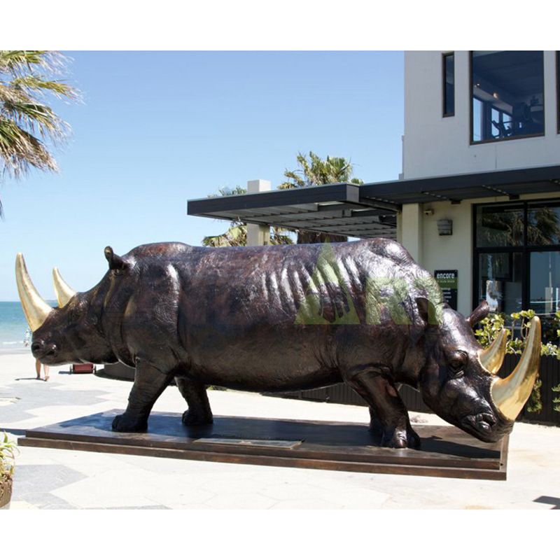 Two-sided conjoined rhinoceros sculpture