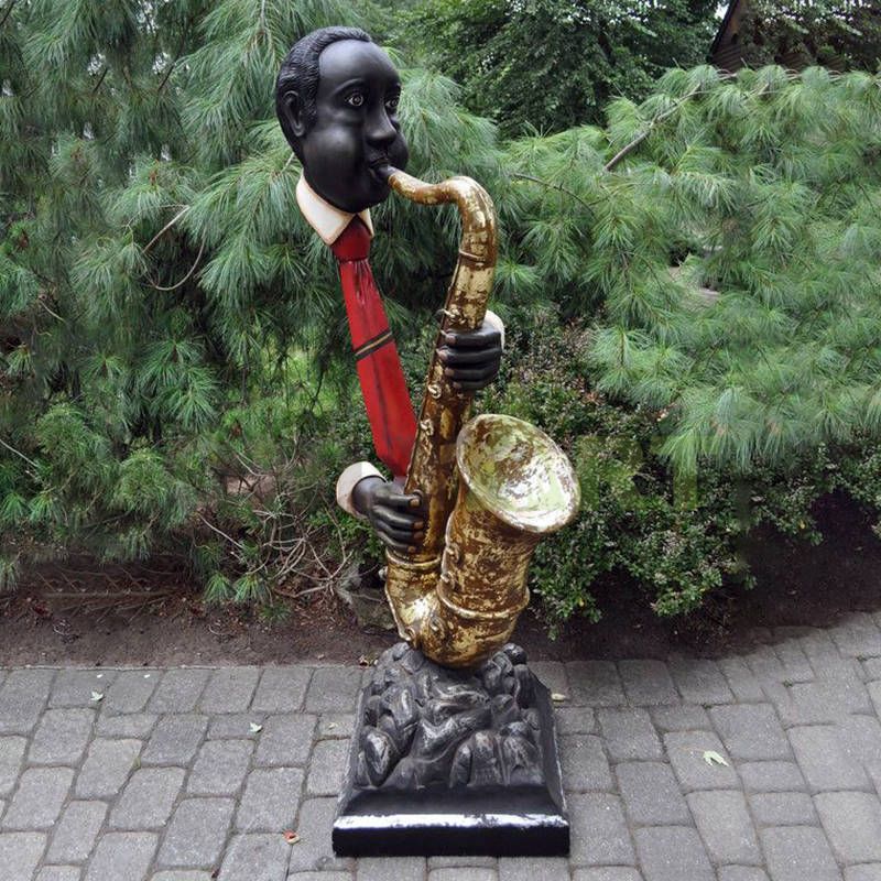 Bronze sculpture of an Indian guitarist