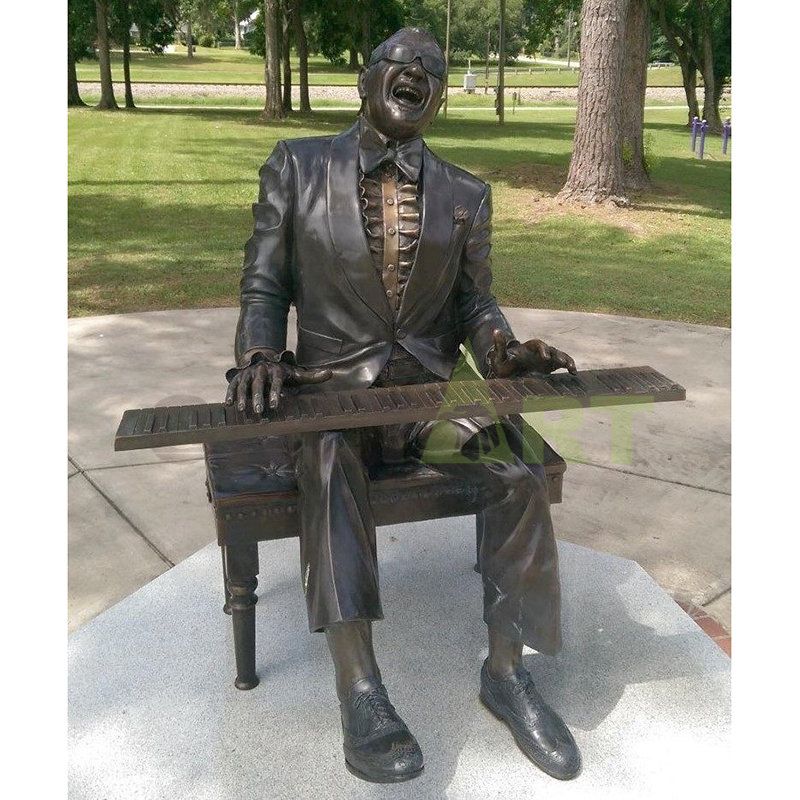 Bronze sculpture of singer with short hair