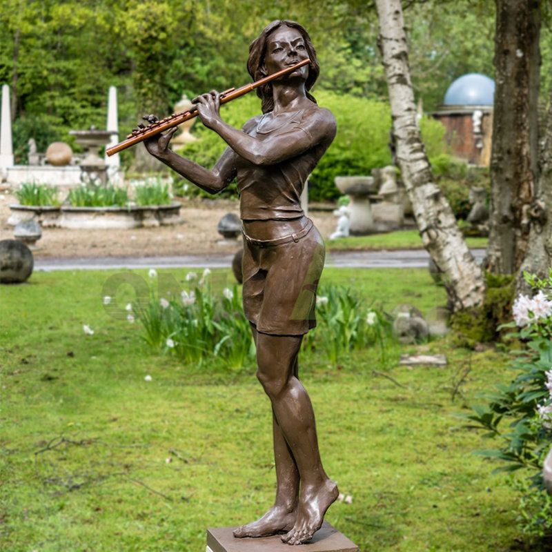 bronze sculpture of musician statue