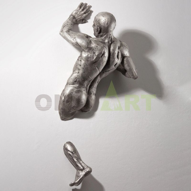 Bronze abstract nude man sculpture Matteo Pugliese on wall statue